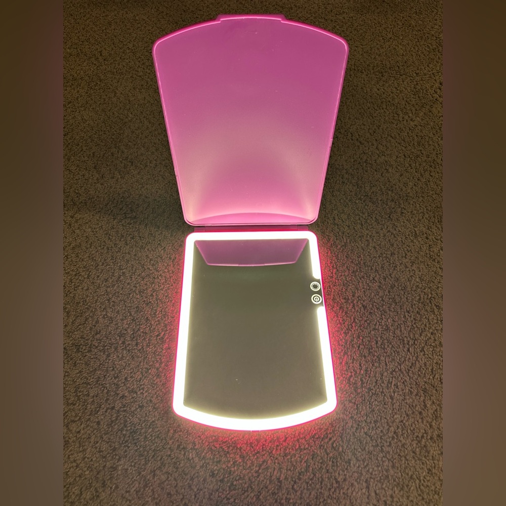 Blushly Super Slim LED Lighted Folding Vanity Mirror Used